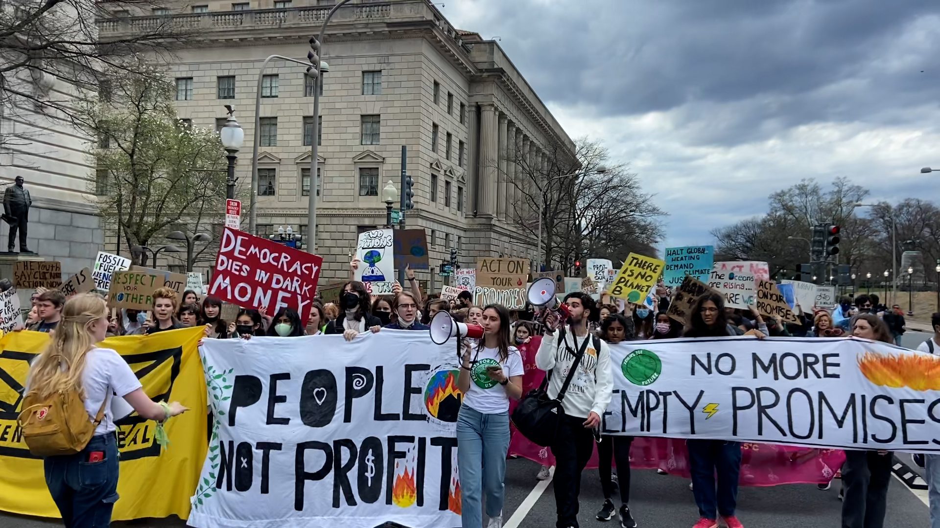activists-march-through-dc-demanding-biden-declare-a-climate-emergency