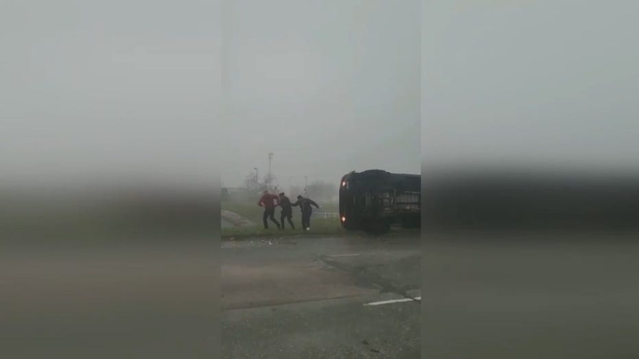 houston-ups-driver-rescued-after-truck-topples-onto-side-during-powerful-tornado-that-ripped-through-region