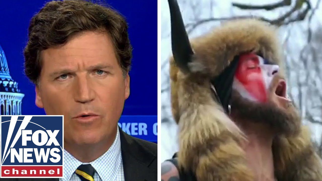 tucker-carlson-on-q-anon-shaman:- “liz-cheney-should-lose-her-job-today.-she-destroyed-a-man’s-life”